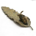 Novelty antique brass pen tray in the form of a leaf with rabbit detail 32cm long