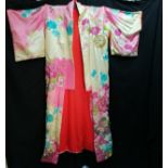 Silk kimono covered in embroidery in good condition
