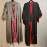 Two kimonos, one grey with pink lining and the other black with butterfly embroidery to back
