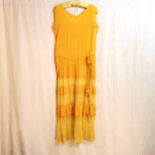 1920s peachy yellow tiered dress flower at waist, overall good condition 88cm chest