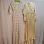 1960s cream satin wedding dress, 82cm chest t/w 1970s lace wedding dress slight damage at back