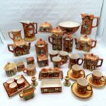 Large collection of Cottage ware china to include Teapots, coffee pots, storage containers, jam pots