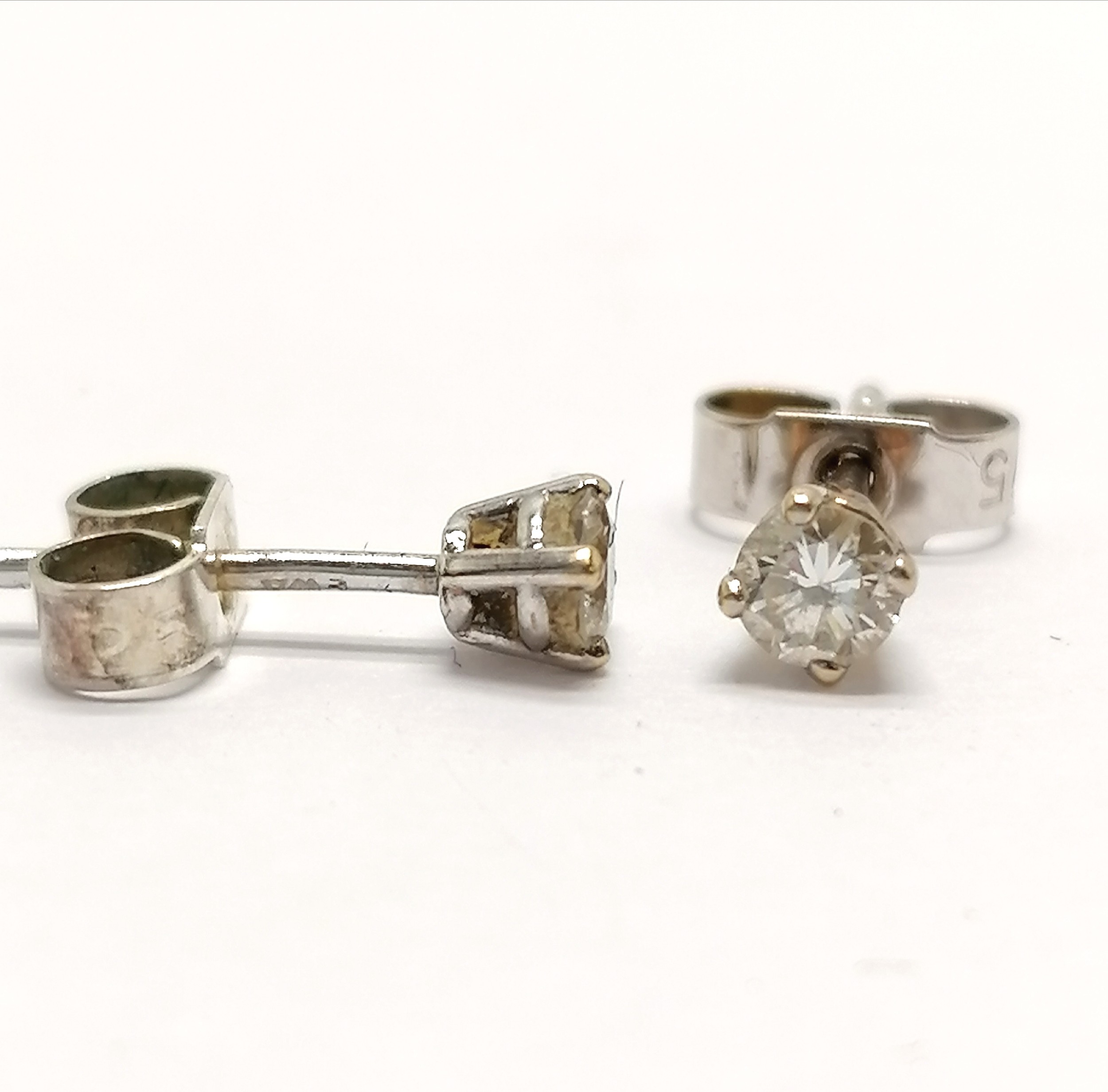 Pair of 9ct hallmarked white gold diamond (3mm diameter) stud earrings - 0.6g total weight - Image 2 of 2