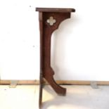 Ecclesiastical carved oak candle stand/reading table, 52 cm in length, 90 cm in height, 30 cm in