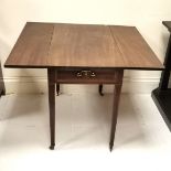 An Antique mahogany Pembroke table, on slender tapered legs ending with castors, single end