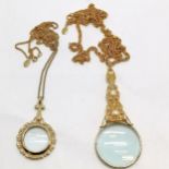 2 x Joan Rivers hand lens pendants on necklaces - longest chain 76cm