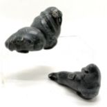 2 Inuit stone carvings of a seal and a walrus both 13cm long with signature and numbers to the bases