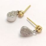 Pair of 18ct white and yellow gold hallmarked diamond set earrings as teardrops, set with total of