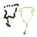2 x antique strands of prayer beads - 1 black beads (20cm long) other mother-of-pearl
