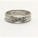 9ct hallmarked white gold crossover ring set with diamonds size J½ - 3g total weight - in overall