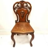 Oak armourial carved hall chair - 88cm high