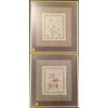 Pair of Oriental framed embroidered panels on silk, frame 35 cm square.