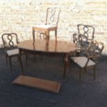 Oval extending dining table and 6 chairs. 105cm x 150cm (closed) x 77cm high.