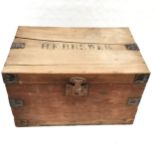 Antique wooden tuck box with metal mounts and H F Brewer to the top and label to interior Barber's