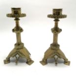 Pair of Gothic revival heavy cast candlesticks terminating on 3 feet - 18cm high & total weight 1.