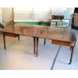 An antique Mahogany D end extending Dining Table with 2 extending leaves, on turned column legs. 212