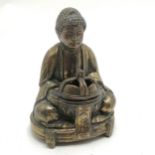 Antique antimony seated Buddha with lidded incense burner detail and script to front - 11cm high &