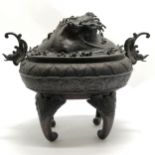 Large Oriental bronze censor with wave decoration to the lid and stylised dolphin handles, signed