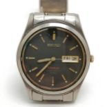 Seiko titanium gents quartz wristwatch (34mm case) in used condition & will need battery
