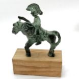 Bronze cast figure of a warrior on horseback mounted on a wooden block 16cm high T/W Indian bronze