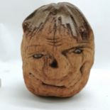 Novelty carved coconut husk of a face with bone carved eyes 28cm high