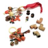 Qty of vintage celluloid kobe charms etc