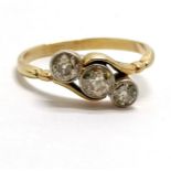 Unmarked gold (touch tests as 18ct) milgrain 3 stone trilogy diamond crossover ring - size P & total