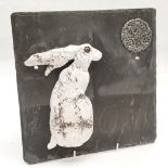 Moon gazing hare mounted on slate plaque 25 cm x 25 cm.