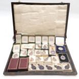 Collection of 1930's and 1940's swimming medals mostly silver some having enamel decoration, for