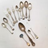 Quantity of silver cutlery 115g including a 1891 engraved butter knife 16cm long, Georgian mustard