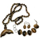 Unusual tigers eye bead necklace with whales tail pendant - 66cm long t/w unmarked silver tigers eye
