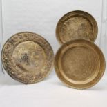Pair of circular brass wall chargers 45cm diameter T/W a pictorial circular wall charger 56cm