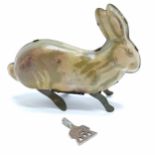 Tin plate jumping rabbit / hare prov patent 4477 - 14cm long & has key & works at time of listing