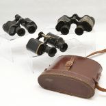 Leather cased binoculars 6 x 30, Carl Zeiss, Jena DF6 x 24779052, and a similar pair, eye piece