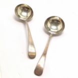1791 George III silver pair of ladles with feather edge detail by Thomas Northcote - 18cm long & 89g