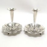 1907 silver unusual pair of spill vases with bonbonniere pierced bases terminating on 3 feet by
