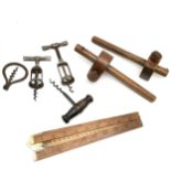Collection of assorted corkscrews, t/w folding ruler etc.