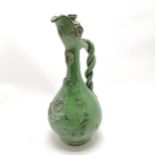 Continental green glazed ewer with twisted handle and paint decoration 36cm high - some losses to