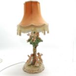 Capodimonte lamp base decorated with putti playing musical instruments, base 41cm high + shade- some