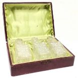 Boxed 3 small cut glass scent bottles 11cm high- 1 has a chip to the rim and box A/F