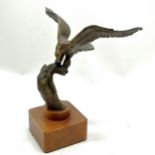 Bronze cast eagle by S A Efron on a wooden base 25cm high wing span 22cm