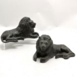 Pair of cast bronze reclining lion figures 19cm long x 10cm high