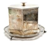 Silver plated hexagonal biscuit barrel on a 3 footed claw and ball stand 17cm high, base 21cm