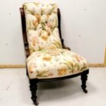 Antique mahogany framed button back nursing chair, on original castors, upholstered in Colefax &