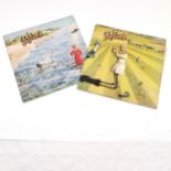 2 x Genesis albums including nursery cryme and foxtrot. Both in good used condition.