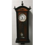 Antique walnut and ebonised wall clock, can not guarantee working order, 78 cm length, 28 cm wide.