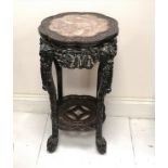 Antique Chinese hardwood carved stand with pink marble inset to top. 42 x 42 x 82cm.