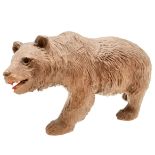 Black forest carved wooden bear with bead glass eyes and red painted mouth measuring 20cm. no