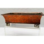 Oriental copper bonsai tray on brass feet, 25 cm long, 14 cm wide, 8 cm deep.