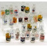 27 x vintage advertising milk bottles inc Daily Mirror, Knorr, Kelloggs frosties etc
